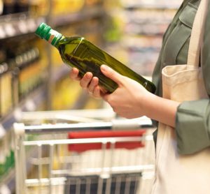 woman shopping for olive oil