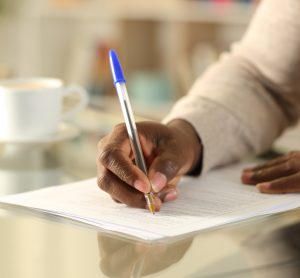 man completing survey